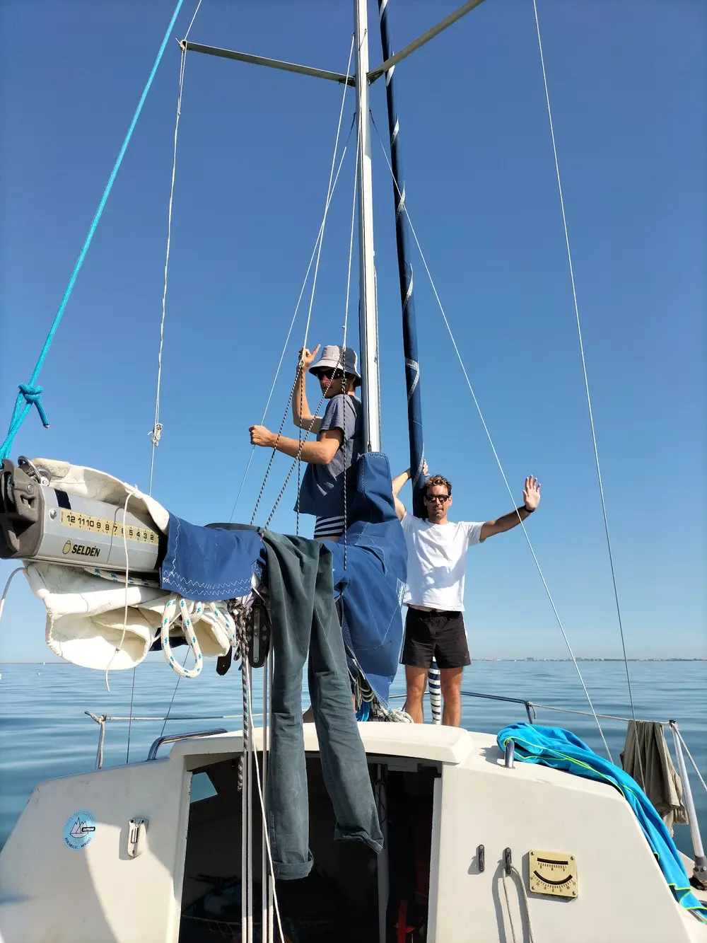 On board a sailboat, at anchor in calm weather